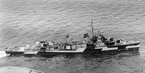 The U.S. Navy destroyer USS Prichett (DD-561) underway off Aiki Point, Washington (USA), on 4 February 1944. The ship is painted in Camouflage Measure 32, Design 13D.