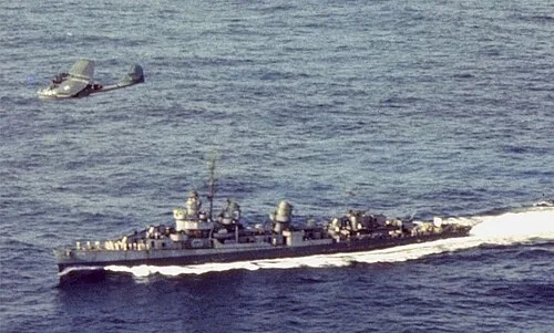 The U.S. Navy destroyer USS Harrsion (DD-573) underway to the Panama Canal in October 1945. The destroyer was accompanying the aircraft carrier USS Enterprise (CV-6) on her was to the U.S. East Coast.