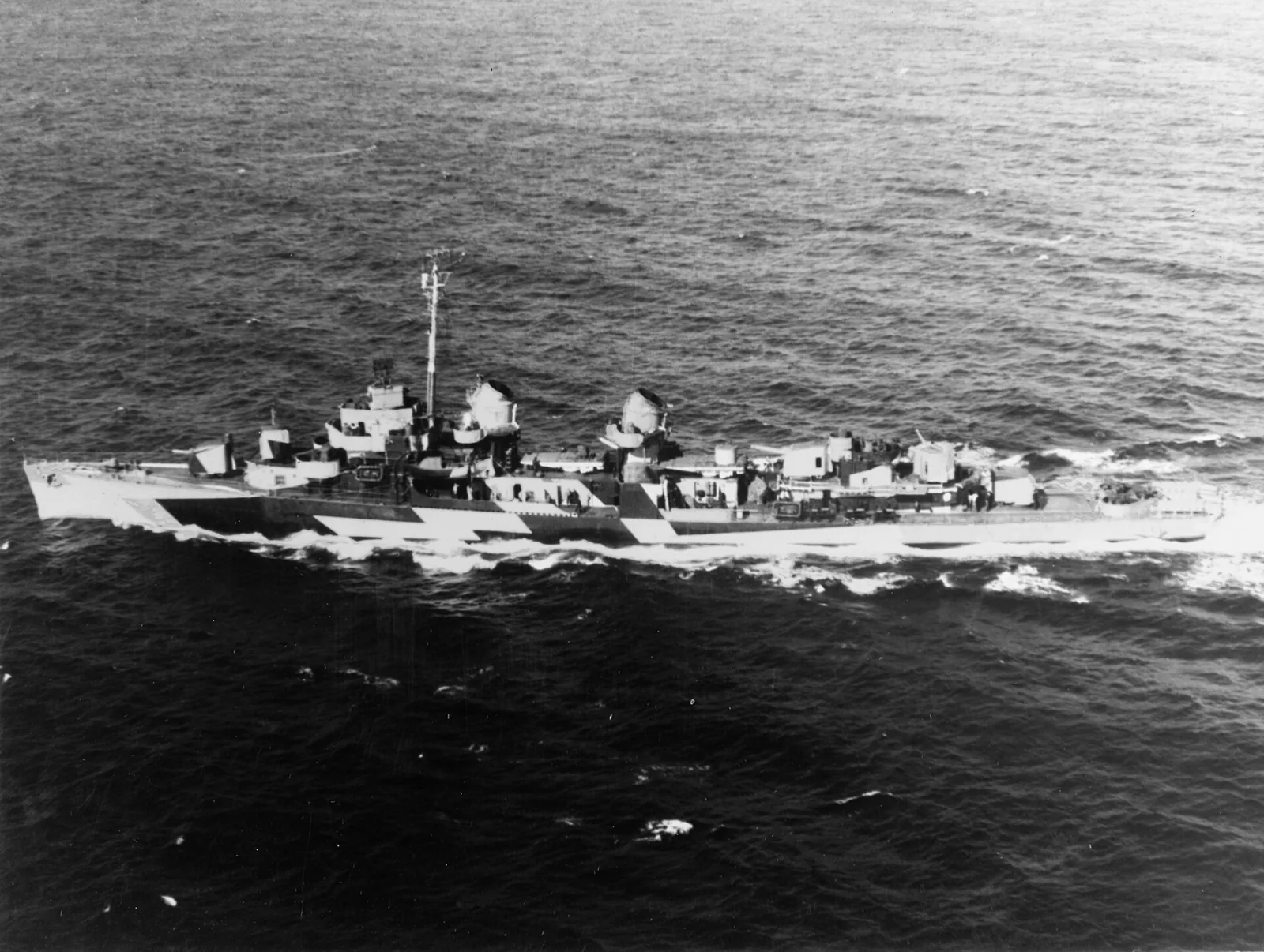 USS Twiggs (DD-591) underway in the Atlantic Ocean on 7 December 1944. She is painted in Camouflage Measure 32, Design 6D. Photographed by Naval Air Station Weeksville. Position: 36°54', 75°13'; Course: 265; Time: 1414;