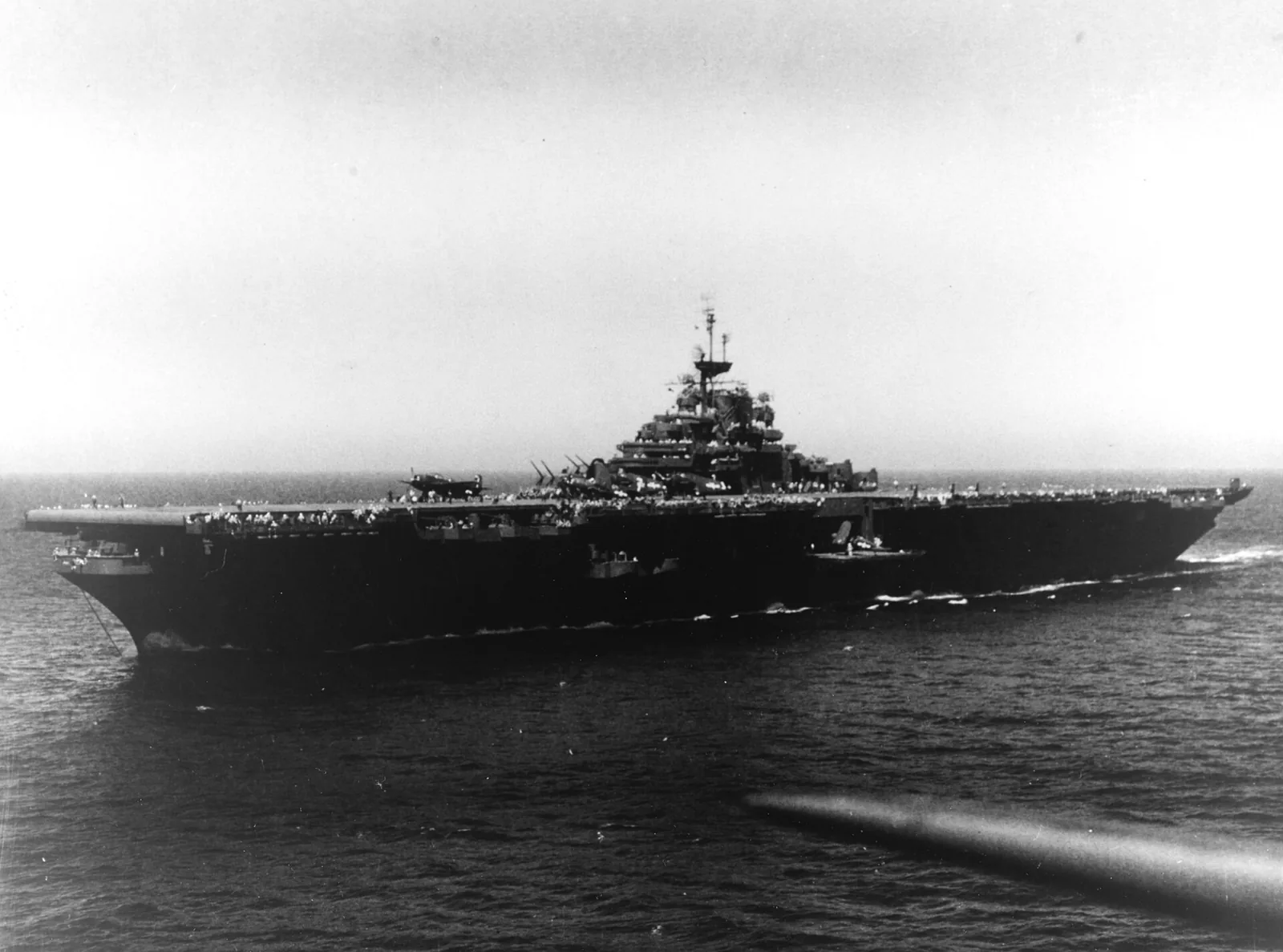 USS Lake Champlain (CV-39) underway at sea on 23 June 1945. She had been commissioned on 3 June 1945.