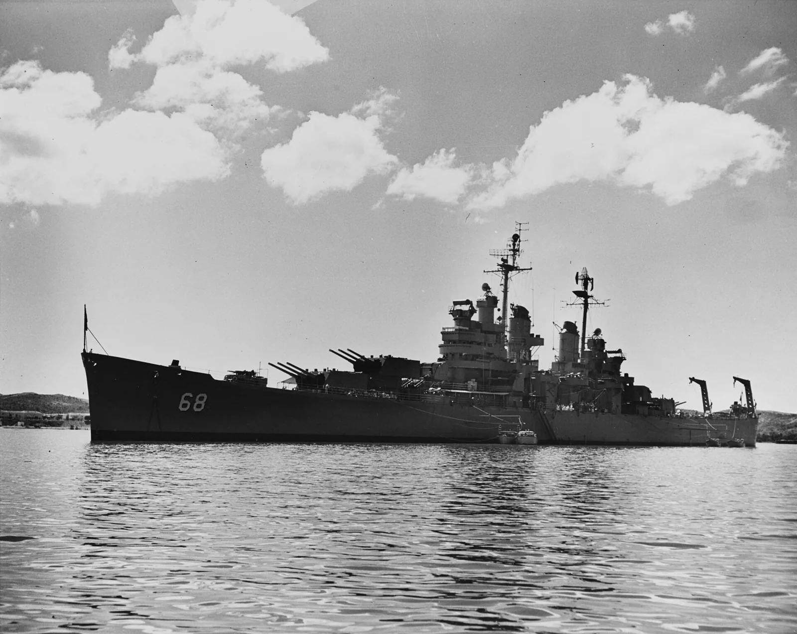 The U.S. Navy heavy cruiser USS Baltimore (CA-68) anchored in Guantanamo Bay, Cuba, on 22 September 1954.
