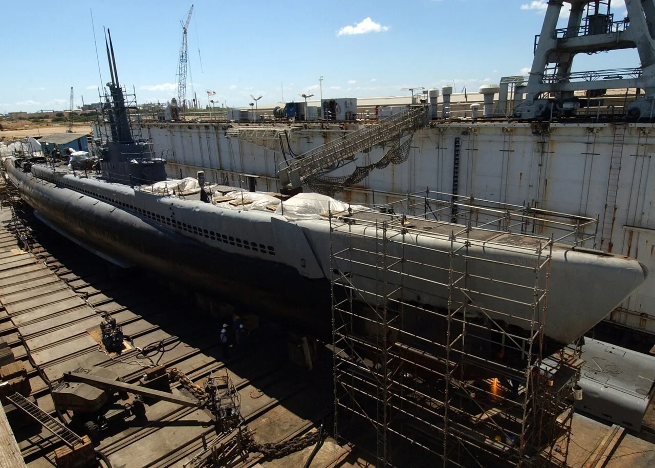 USS Bowfin (SS-287) at their shipyard near the former Naval Air Station Barber's Point, during a restoration project. Bowfin has served as a floating m...