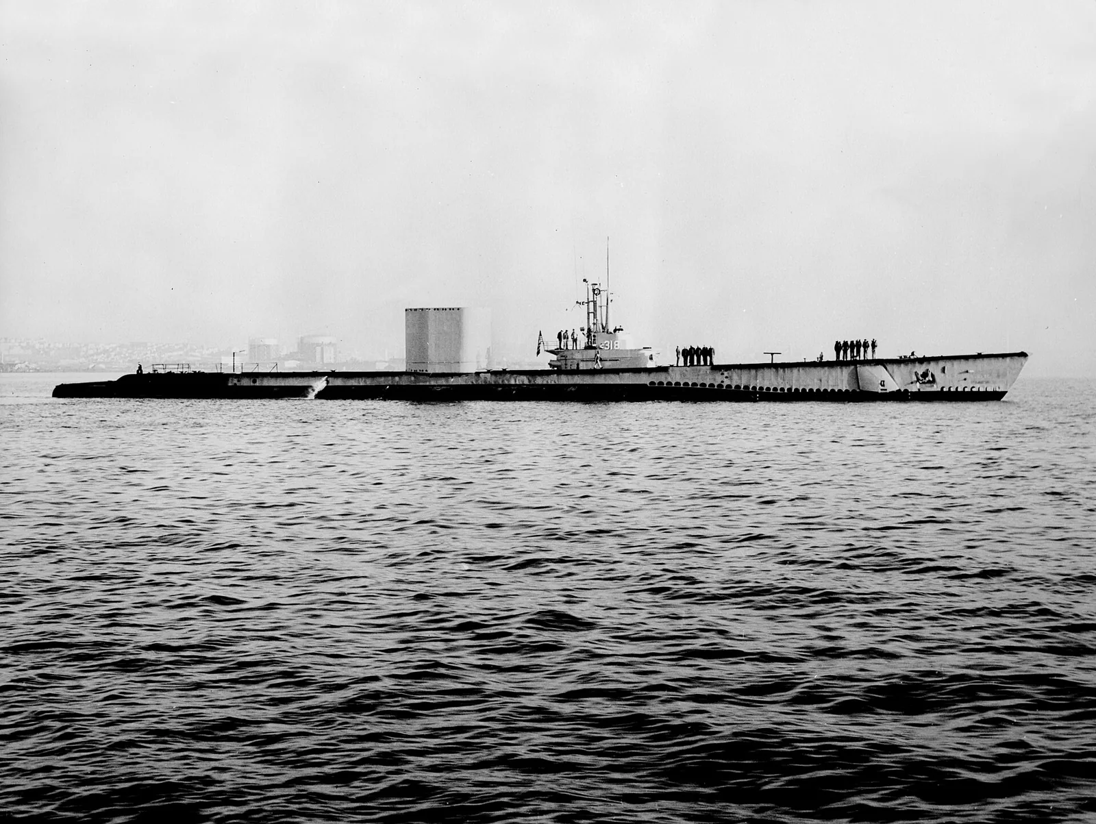 The U.S. Navy submarine USS Baya (AGSS-318) underway off the San Francisco Naval Shipyard, California (USA), in 1956.
