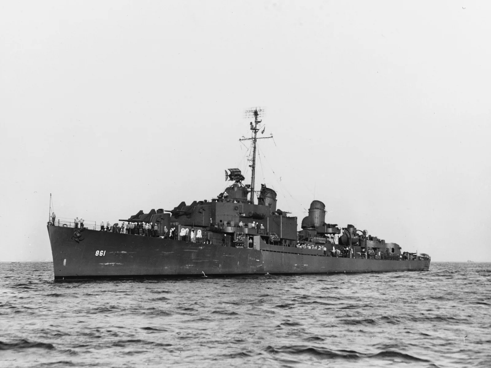 The U.S. Navy destroyer USS Harwood (DD-861) photographed circa in the summer or autumn of 1945. She is painted in Camouflage Measure 21.