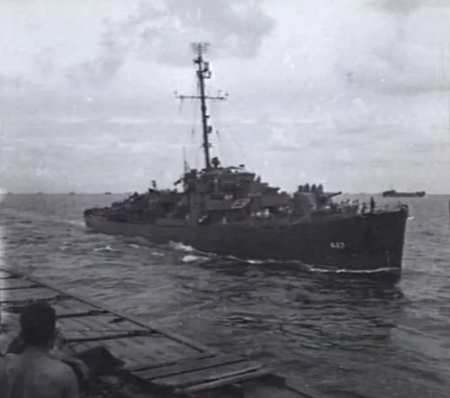 USS Albert T. Harris (DE-447) passing messages along a line to the tank landing ship USS LST-640, which had Australian troops of 2/43rd Infantry Battalion aboard en route to Labuan, Borneo, for their part in the "Oboe VI…