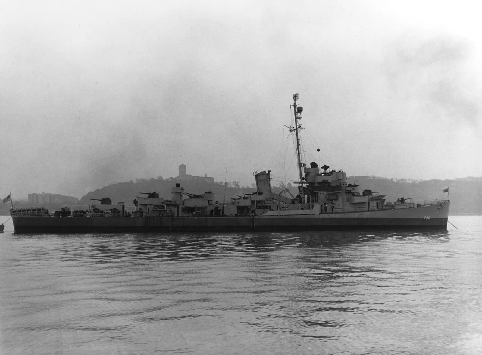 USS Borum (DE-790) anchored off New York City on 26 October 1945. The ship is painted in Camouflage Measure 22.