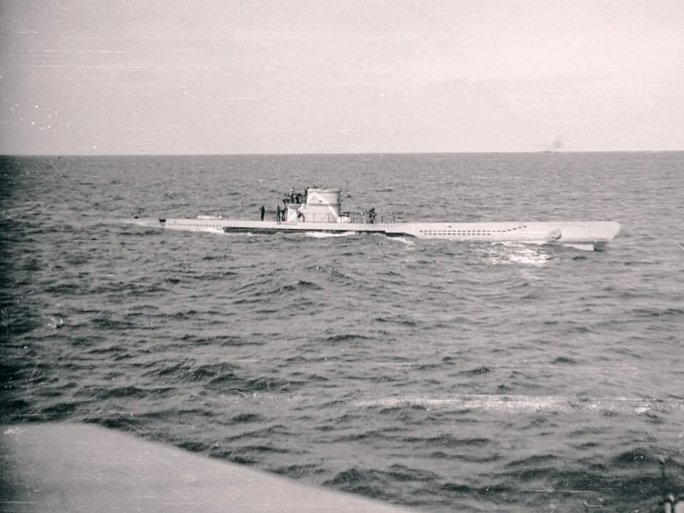 The German Type VIIC submarine U-660 surfacing after being depth charged by HMS Lotus (K139) and HMS Starwort (K20) off Oran, Algeria, 12 November 1942. The crew scuttled the boat. Two crewmembers died, 45 survived.
