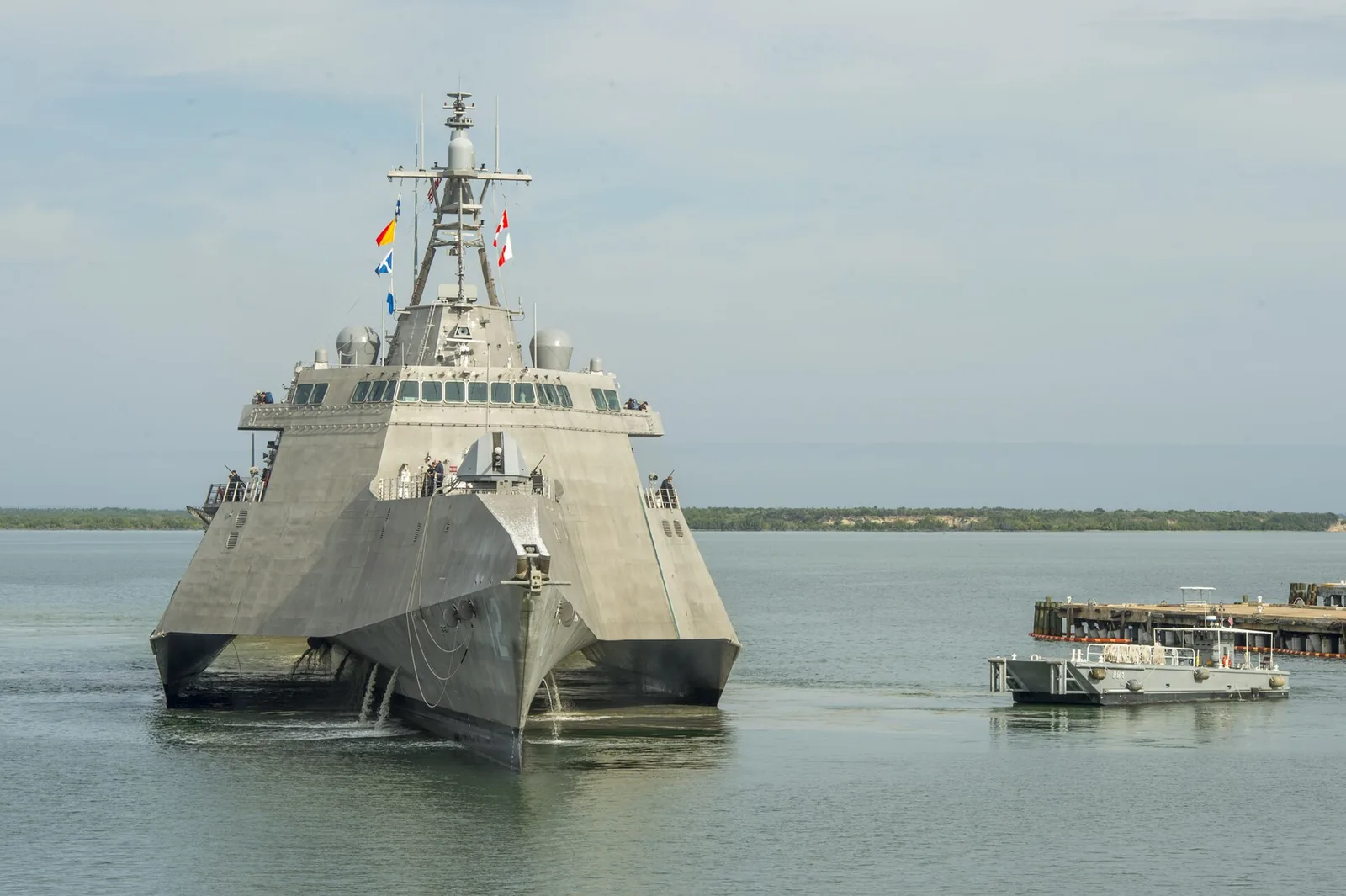 USS Omaha (LCS 12), a littoral combat ship, pierside at the installation during a brief fuel stop. OMAHA is conducting a change of homeport to San Diego. Nav...