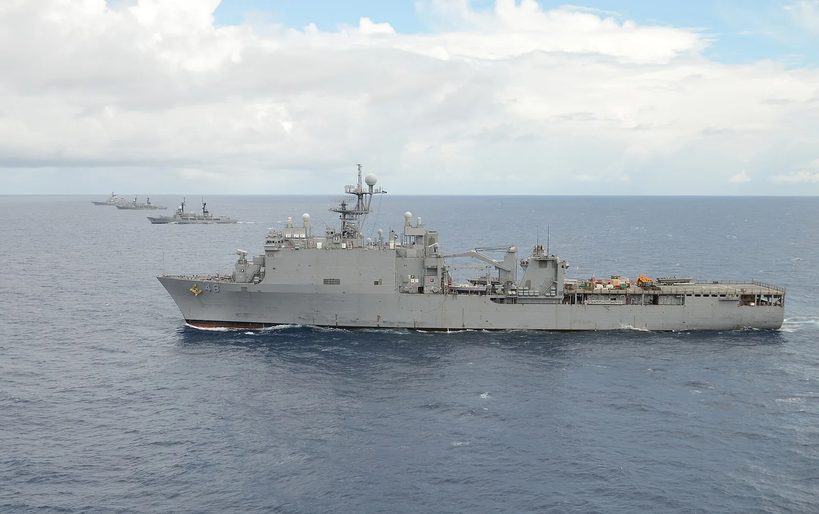 USS Ashland (LSD 48) is underway with, from top, the Arleigh Burke-class guided-missile destroyer USS John S. McCain (DDG 56) and the Philippine navy frigates BRP Gregaorio...
