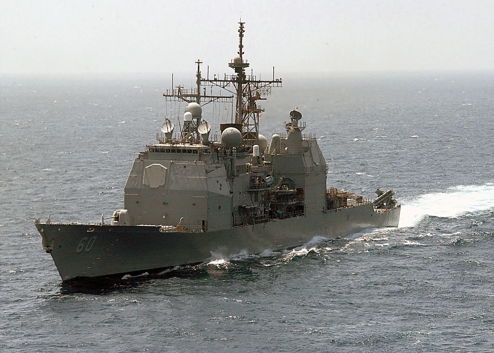 USS Normandy (CG 60) steams along side Washington during an underway replenishment (unrep). Washington is homeported in Norfolk, Va. and is on a six-month deployment conducting combat missions in support of Operation...