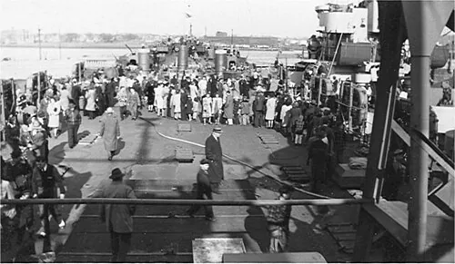 LST-317 with visitors aboard. Probably taken at date of commissioning at New York Navy Yard, 6 February 1943. Official US Navy photo