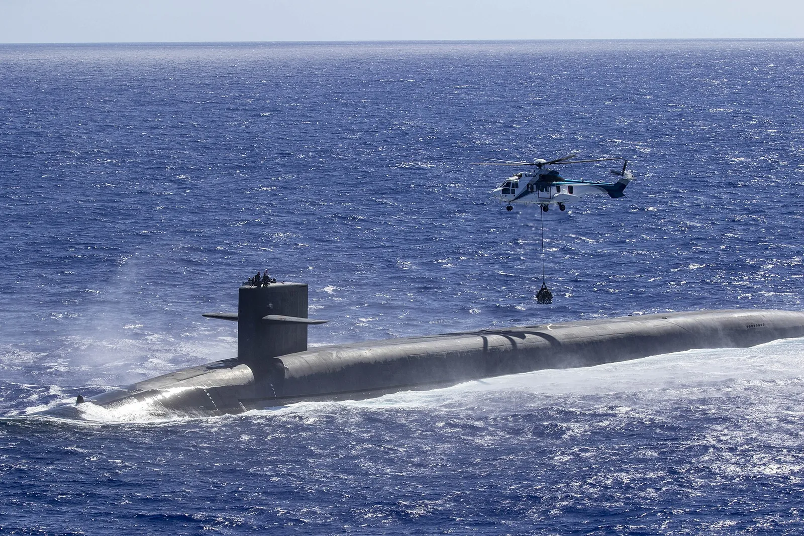 USS Louisiana (SSBN 743) during a vertical replenishment at sea, June 28, 2024...