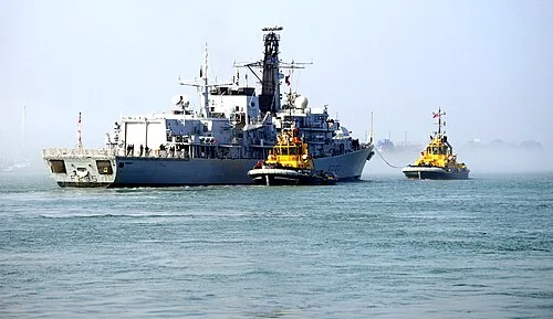hms monmouth coming in to a veyr foggy portsmouth harbour , tyoe 23 frigate built in devonport in 1991 the seventh ship to bea the name. not a great quality as the fog was quite bad