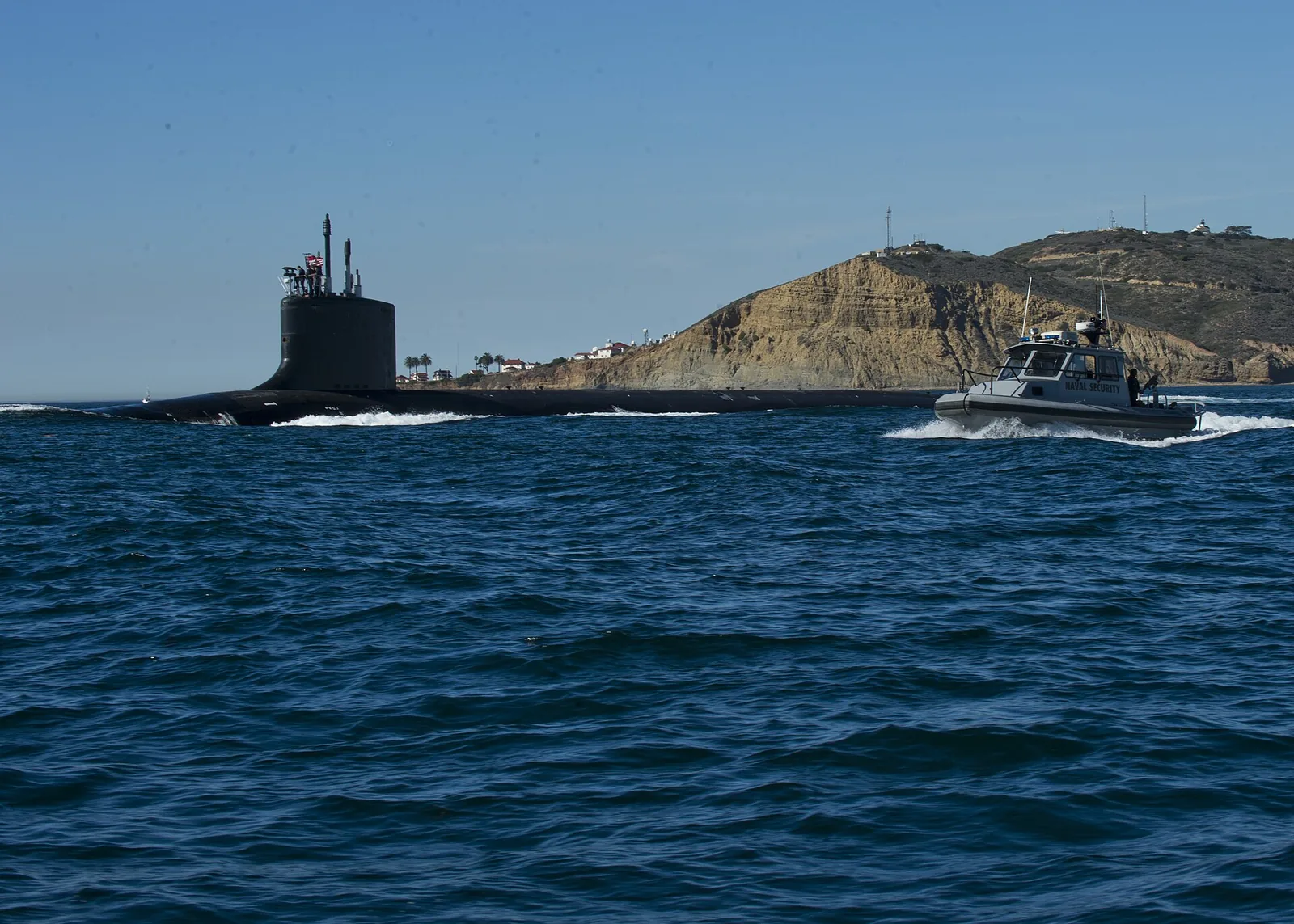 SAN DIEGO (Feb. 6, 2013) Sailors assigned to Commander Navy Region Southwest Harbor Patrol escort as Virgina-class fast-attack submarine out of San Diego Harbor during a high-value transit. (U.S.
