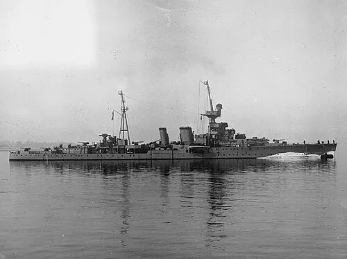British light cruiser HMS COVENTRY underway in coastal waters.