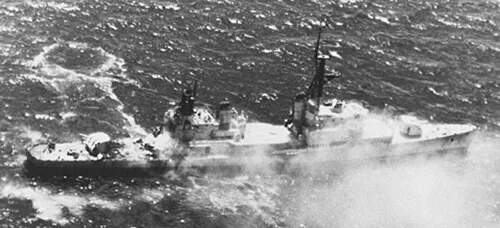 The decommissioned U.S. Navy destroyer USS William M. Wood (DD-715) as a target for Harpoon anti-ship missiles off Puerto Rico during Operation ReadEx 1-83 in March 1983.