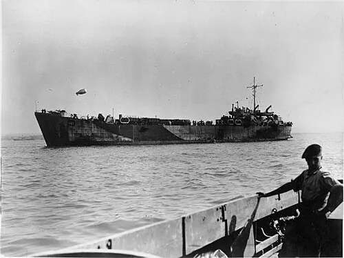 The Royal Navy during the Second World War LST 421 laden with 600 tons of ammunition and US lorries leaving for France across the English Channel.