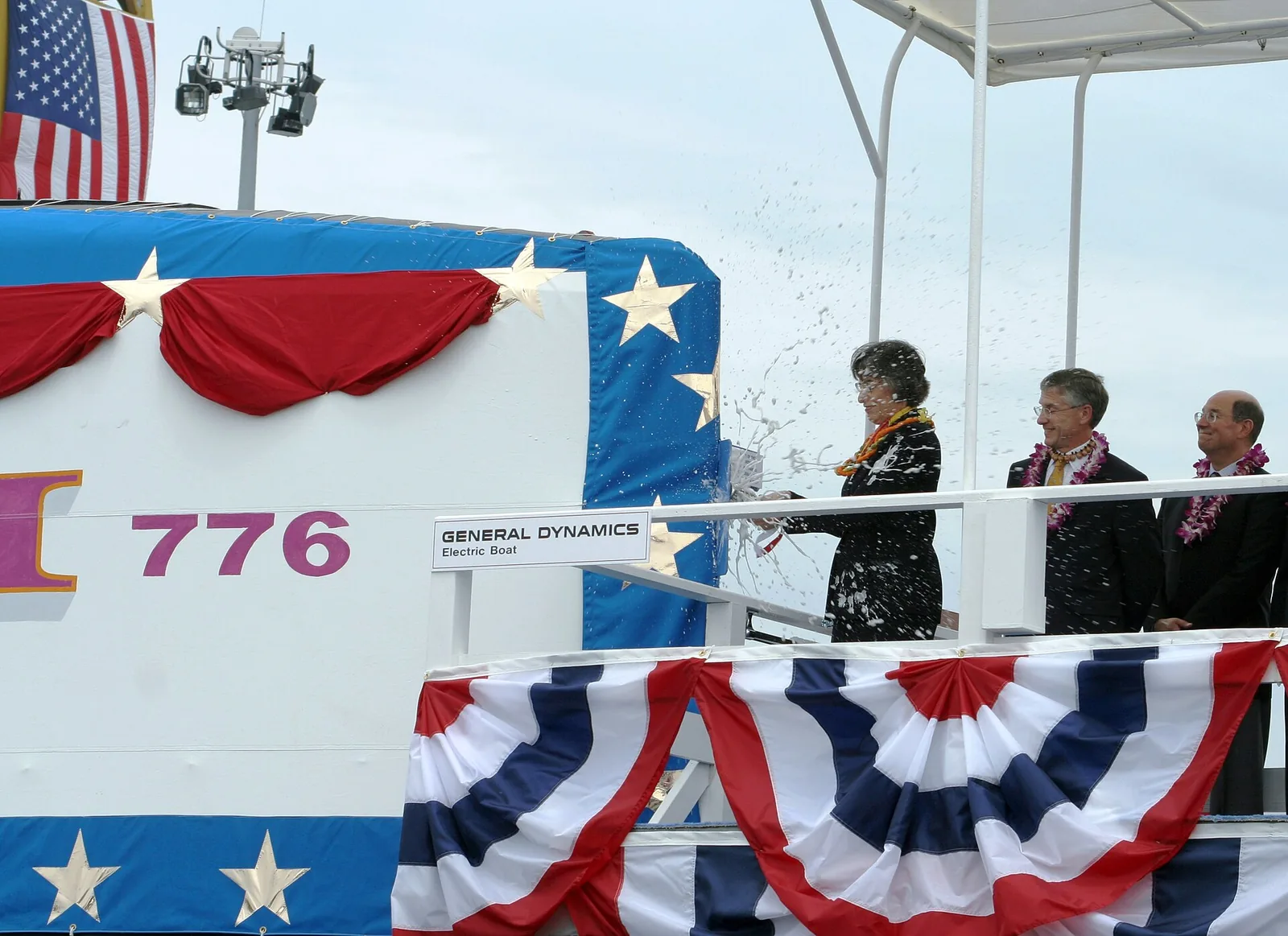 Groton, Conn. (Jun. 17, 2006) - Hawaii Governor, the Honorable Linda Lingle smashes a bottle of champagne against the sail of the Virginia-class nuclear attack submarine Pre-Commissioning Unit (PCU) Hawaii (SSN 776) duri…
